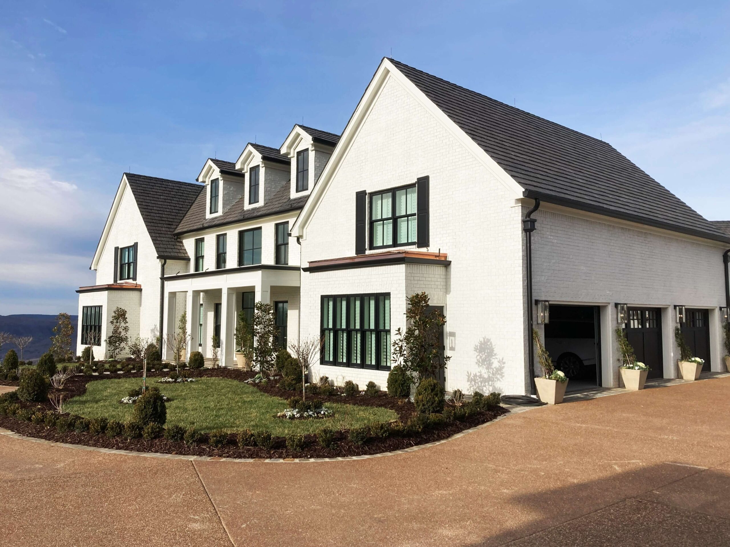 White house with landscaped garden