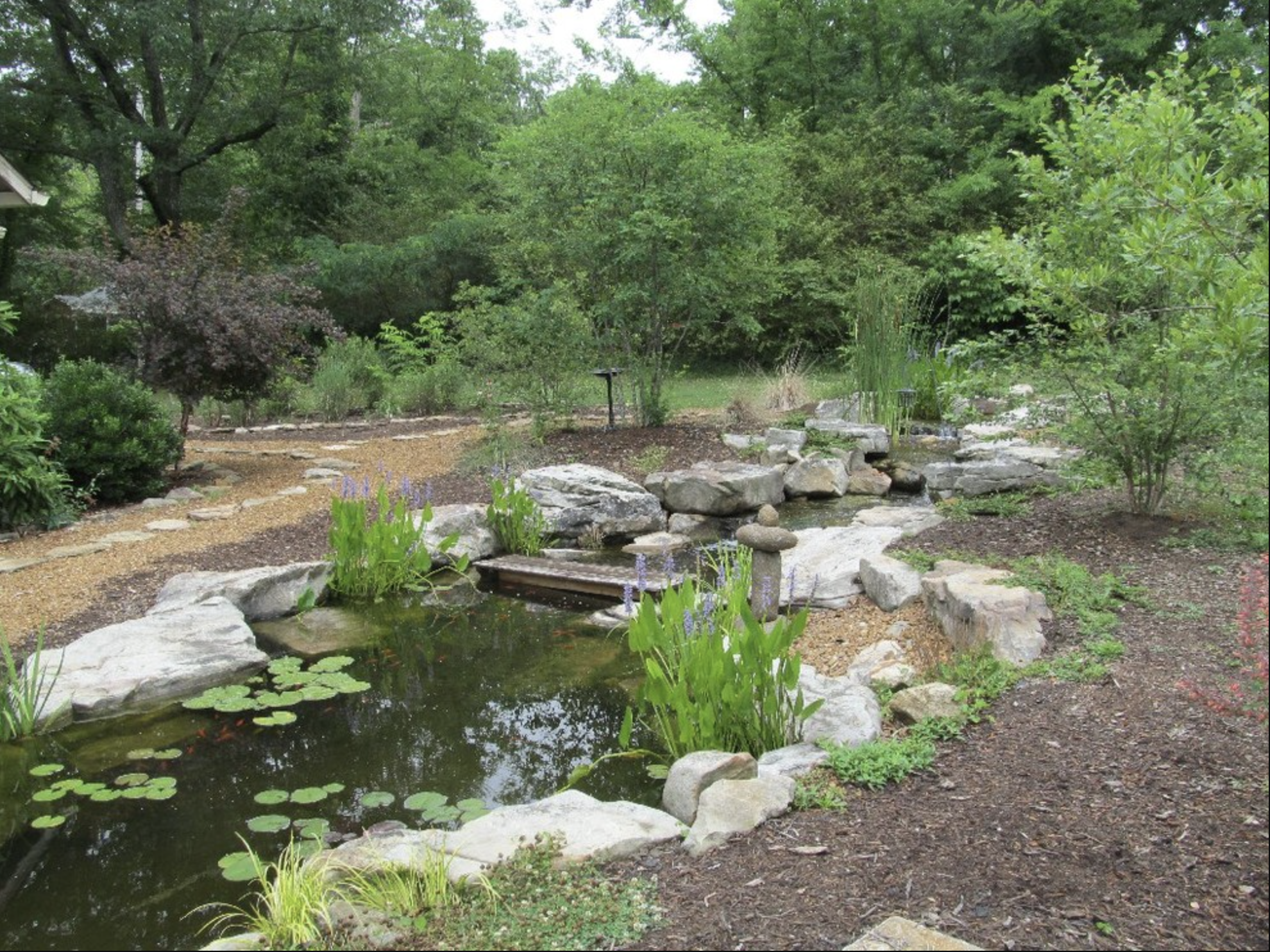 Signal Mountain home with beautiful pond flowing through